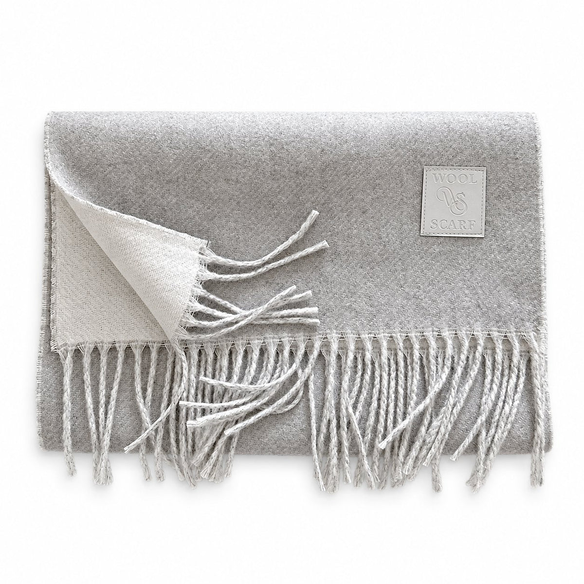 Imagination Hunt gray scarf folded to show its pale reverse, fringe and square patch Main image